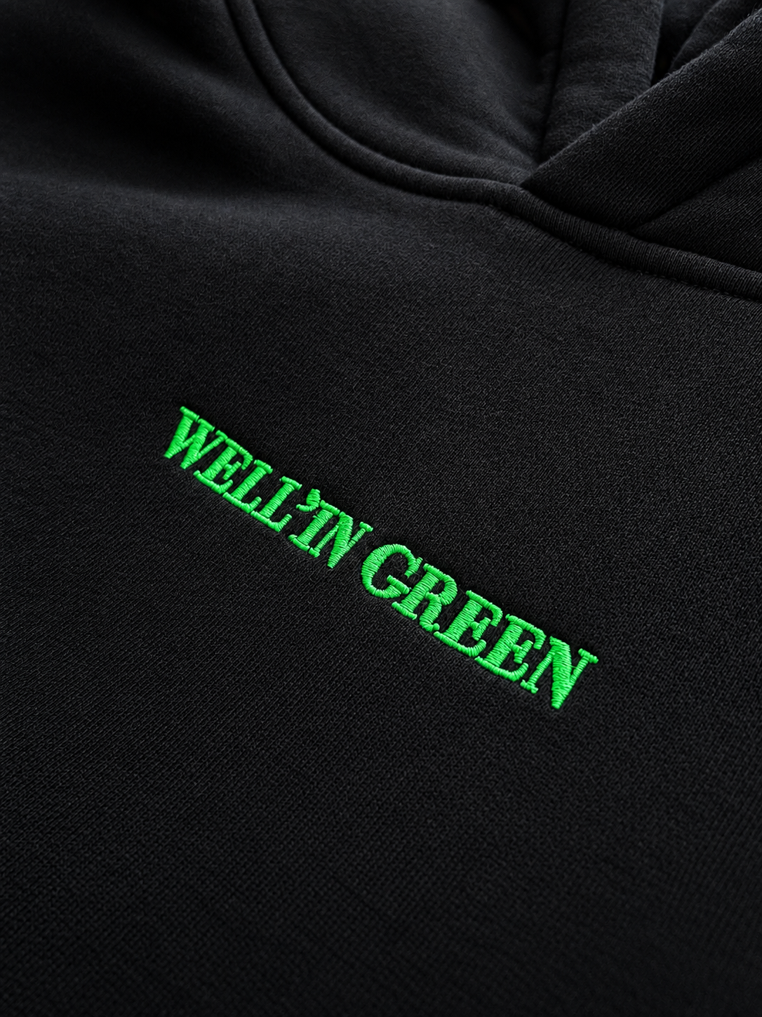 Détail du logo du sweat Well'in Green